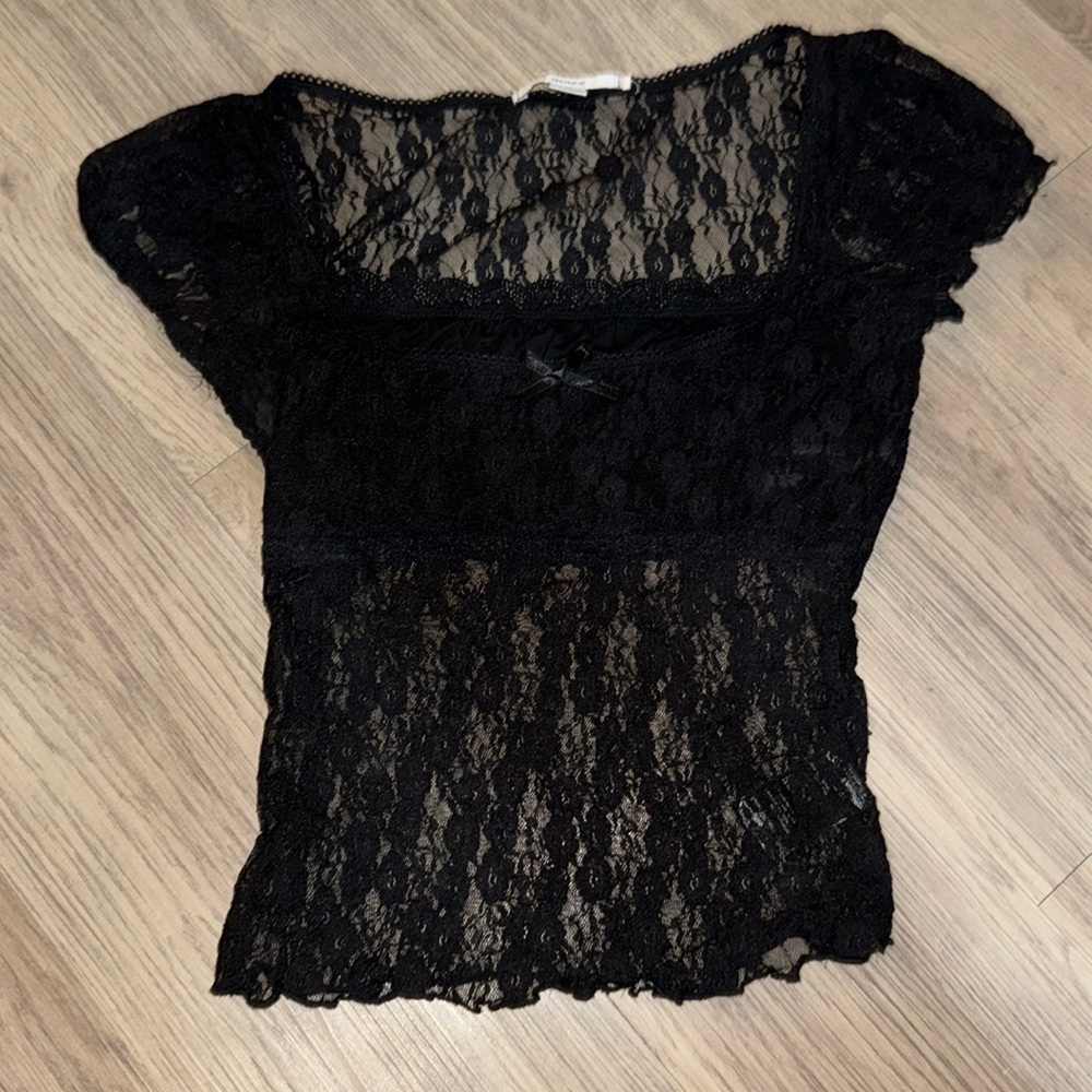 Urban outfitters lace top. Black lace and chest area is double lined.